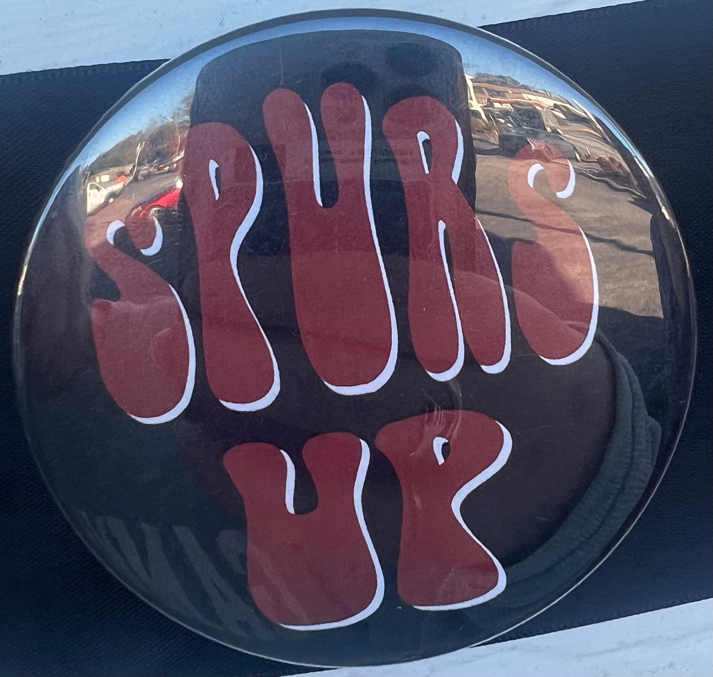 Spurs Up Button